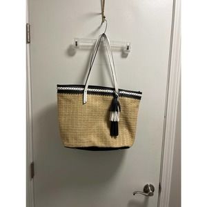 * Woman’s Sondra Roberts Squared Straw Purse.